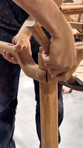 Assembling Wood Furniture Components Using Traditional Joinery Techniques and a Wooden Mallet
