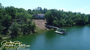 1.9K views · 20 shares | This location on Smith Lake is the absolute closest you can get to I-65! Situated on a very private lot with nice views in a private cove. Huge, wide open spaces on the main level with travertine, hardwood, and ceramic. A nice covered porch overlooks the lake. $549,900 Call me! 205.468.6375 | Smith Lake Alabama Homes and Land from Justin Dyar at Lake Homes Realty | Facebook