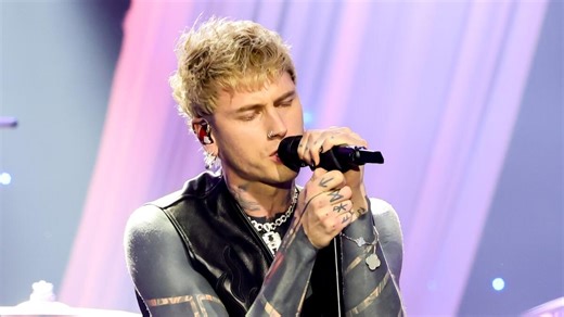 MGK Unveils Latest Ink With Striking New Ear Tattoos