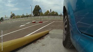 Vehicle starting driving examination, demonstrating turning maneuvering, safety Stock Video