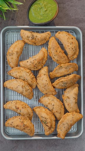 Bharat Wadhwa on Instagram: "What would you call it?? Aloo Gujiya Snack FOR DOUGH 1/2 Cup Water 1/2 tsp Carom Seeds 1 tsp Salt 1 Tbsp Oil 1 Cup Whole Wheat Flour FOR ALOO MASALA 2 Tbsp Oil A Pinch Of Hing 1 tsp Cumin Seeds 1/2 tsp Fennel Seeds 1 tsp Coriander Seeds 1/2 Cup Peas 1/2 tsp Turmeric Powder 1 tsp Coriander Powder 1 tsp Kashmiri Red Chilli Powder 3 Boiled potatoes 1 tsp Salt 1/2 tsp Amchur Powder 2-3 Green Chillies 1/2 tsp Roasted Cumin Powder Coriander Leaves 1/2 Black Salt FOR BATTER