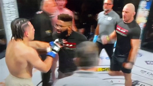 UFC star Sean Strickland storms cage and punches fighter in wild scenes after seeing what he did to teammate