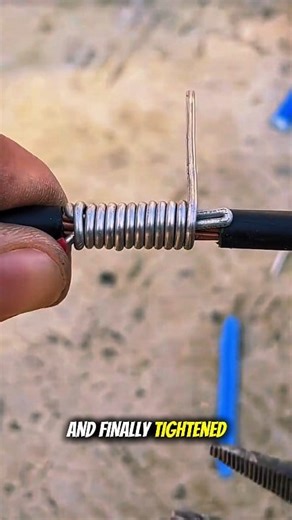 DIY wire splice: Strip, coil, and tighten for connection. #lifehacks #creativity #electrician #diyprojects | Az0754