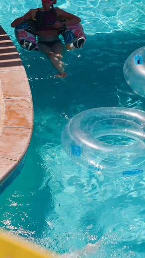 This is what summer days are meant for — a cold drink, a good book, and endless trips around the lazy river! ☀️🏝️ Click the link in our bio to book your stay or grab a one-day pool membership and come see us for just the day! 😎 | Arcadia Resort