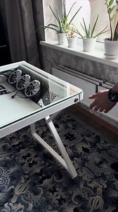 Every gamer’s dream: custom PCs seamlessly built into glass-top desks.📹 desktop_lab1