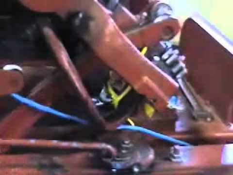 how the knotter of square baler works.wmv
