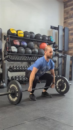 Tomorrow’s strength work locks in the most critical position of the clean. Every 1:15 for 12 sets: 2 pause squat cleans (pause just below the knee) at moderate, technique-focused weight. That deliberate pause below the knee forces perfect back angle, tight lats, and weight over mid-foot exactly where it needs to be as the bar crosses the knee. Master this checkpoint and the rest of the lift falls into place. Video shows the full sequence: controlled pull off the floor, rock-solid pause, then exp