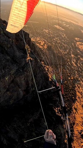 Spiraling down to skim cliffs is a dream come true. #apogeeparagliding #gingliders #sunset #joy