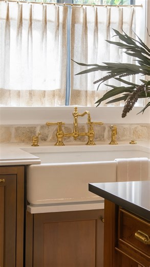 Woods Design House | Northeast Houston Interiors on Instagram: "the details you’ve all been begging for 👇 ✨Brass Rail: @pepeandcarols Brass kitchen rail ✨Sink Faucet: @newportbrass 9462/03N in Polished Brass Uncoated ✨Cafe Curtains: @fabricut Sibyl Birch Fabric with @pepeandcarols Solid Brass Cafe Curtain Rod ✨Paneled Front Appliances: @crystalcabinets Current MDF-Linen ✨Island Design: yours truly 🫶 You might want to hold onto this one for ur next kitchen project! • • • • • • Keywords: french 