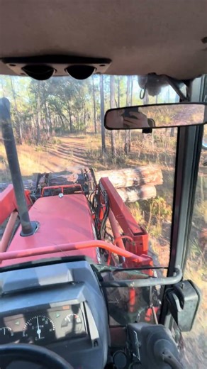 Kubota M5700 moving some logs for the sawmill