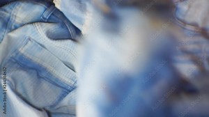 movement of falling jeans on a pile of denim pants. 1920X1080 Full Hd.