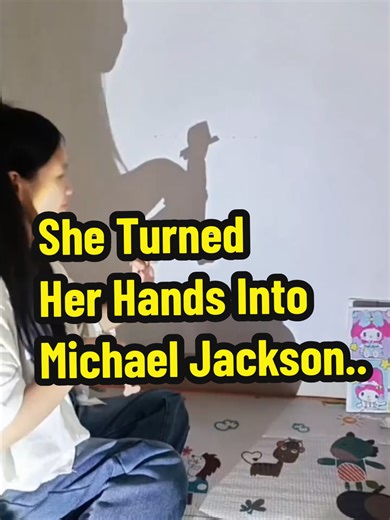 Witness the incredible art of shadow puppetry as a talented woman transforms her hands into the legendary Michael Jackson! With just a simple light source and a white wall, she masterfully crafts the iconic silhouette of the King of Pop. Watch as her fingers and palms move in perfect sync to mimic MJ’s signature dance moves, think moonwalks, spins, and that unforgettable hat tilt. It’s a stunning display of creativity, precision, and pure nostalgia. A must-watch for fans of MJ, shadow art, and a