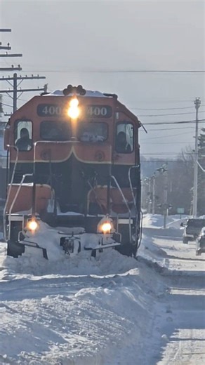 Escanaba and Lake Superior Railroad 400 & 1221 break up ice packed railroad crossings in downtown Iron Mountain, MI before bringing their train thru town.. | Escanaba & Lake Superior Railroad w/ Jason Asselin