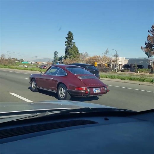 Classic Porsche 911 driving on the 101