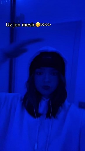 Person in Hoodie Expresses Cool Vibes with LED Lights