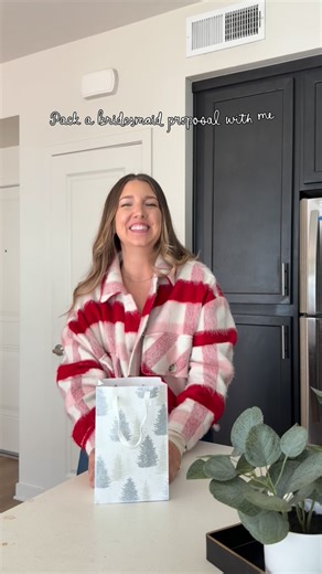 Franki Boker on Instagram: "They said YES! I officially asked all my bridesmaids to be in my wedding party💕 Building the little proposals was so much fun. I asked every between mid December to January so it was easy to disguise the gift as a Christmas gift. I filled each bag with a bridesmaid glass tumbler/ one for the maid of honor, a pink heart shaped honey stirrer, a small lip balm that was pink or red, a small heart shaped note and because we are planning a destination wedding; a little tra