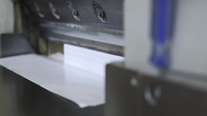Premium stock video - Paper cut press in the industry