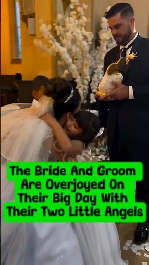 The Bride And Groom Are Overjoyed On Their Big Day With Their Two Little Angels. #wedding