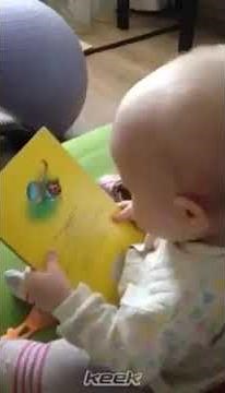 Funny Baby Reading A Book