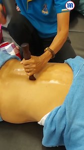 These massage therapists are using a hammer and stake to ease pain! 🤔 | Daily Mail Video