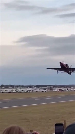 Shaky vertical phone footage — jet miscalculates stunt, heads directly toward audience.