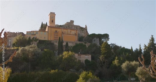 Medieval Eze Castle on hilltop with surrounded historic Eze museum village, Côte d'Azur, South of France