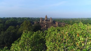 Angkor Wat Aerial Reveal Cambodia Tourism Establishing shot Drone Sunrise | Premium Stock Video Footage