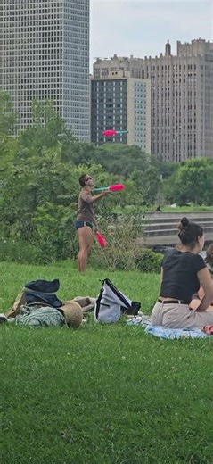 Guy juggles in speedos in front of women at the lake. #juggling #speedos #lakefront