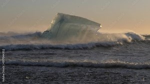 Diamond Beach Golden Hour Iceland with Icebergs in the Crashing Waves at Sunset