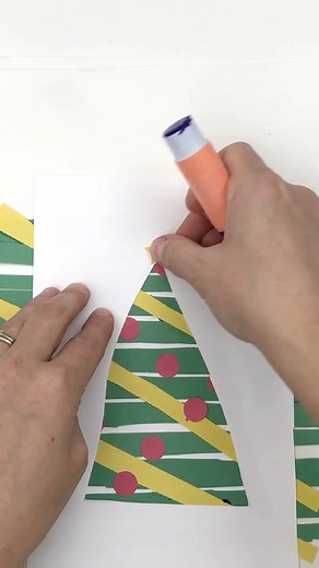 Get some scissor practice in while creating this super cute Christmas tree craft!! Comment "Christmas Trees" to see them ALL 🎄 #Christmascraftsforkids #scissorskills #easycraftsforkids #KidsChristmas | Construction Paper Crafts for Kids