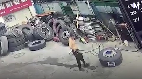Inches from death! Mechanic narrowly dodges exploding truck tire