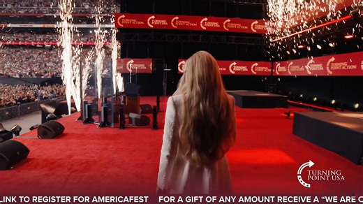 Erika Kirk has taken the stage.