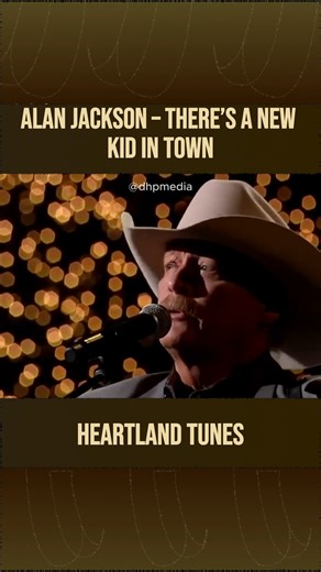 Alan Jackson – There’s A New Kid In Town...🎧 Tap to hear full song: https://countrysong.oldiesclassic.org/alan-jackson-theres-a-new-kid-in-town-intro-away-in-a-manger/?utm_source=facebook&utm_medium=hreel&utm_campaign=vintagecountrysidemelodies | Vintage Countryside Melodies