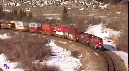 6.3K views · 555 reactions | Near Exshaw, Alberta, a Canadian Pacific train that starts as a unit stack train, then a unit grain train and finally a unit tank train! From the Highball Productions show "A Rocky Mountain Winter" https://rfd.video/RockyWinter | Railfan Depot | Facebook