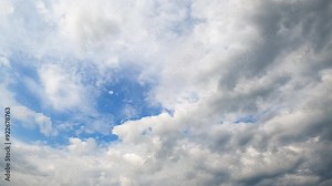 Cumulus cloudscape moving the atmosphere. Sky can't be seen behind the thick clouds. Low angle view. Timelapse.