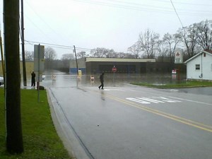 Rescue Crews Swarm Lisle to Evacuate Residents, Control Flooding