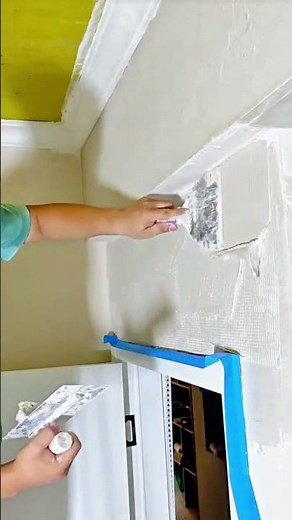 Professional Wall Repair: Applying Joint Compound and Tape to Seamlessly Smooth a Rough Surface