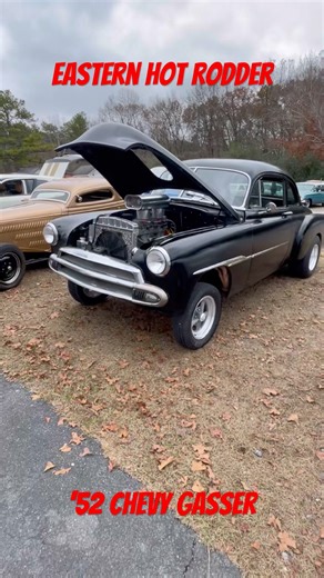 ‘51 Chevy street gasser with a high carb diet. Dual quads on a tunnel ram. This would be fun.
