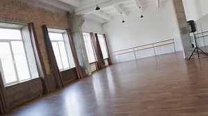 Empty Dance and Fitness Studio with Wooden Floor and Large Windows | Free Stock Video Footage