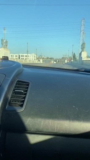 Dashboard Perspective: A Car's Journey Through City Streets