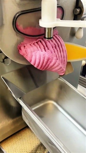 Frozen swirl flows smooth machine molds sweet delight