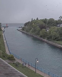 🛥 Boater attempting to outrun a severe thunderstorm into the Charlevoix channel around 11:15 AM today (6/21). Video courtesy of CharlevoixCam. | Great Lakes Weather & Climate