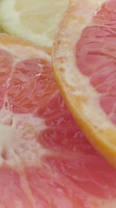 Texture of fresh grapefruit slices - Free Stock Video