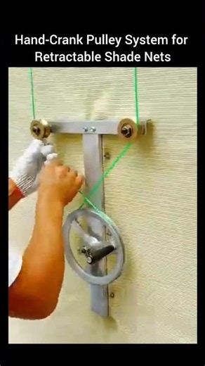 Hand-Crank Pulley System for Retractable Shade Nets.