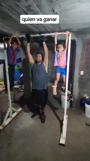 Fun Pull-Up Challenge Between Adult and Child