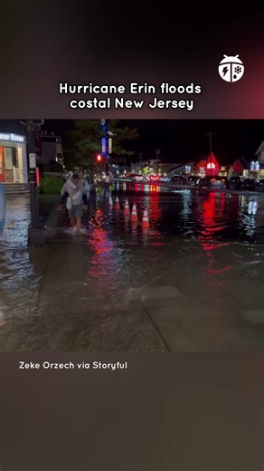 4.7K views · 94 reactions |  Floodwaters swallowed streets in New Jersey on Thursday night as Hurricane Erin pushed dangerous tides and powerful surf along the shore. The National Weather Service warned of tropical-storm-force gusts, waves up to 17 feet, and severe beach erosion. | WeatherBug | Facebook