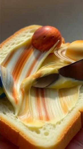 “Mini planets spread like butter 🌍✨ Too satisfying to miss!”