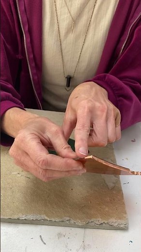Foiling a stained glass piece with the copper foil technique