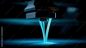 Extruding multiple filaments of plastic from an industrial 3d printer, creating a physical object layer by layer in a dark environment, highlights advanced additive manufacturing