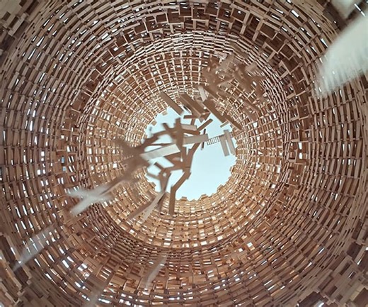 Watch a Massive Kapla Tower Come Crashing Down